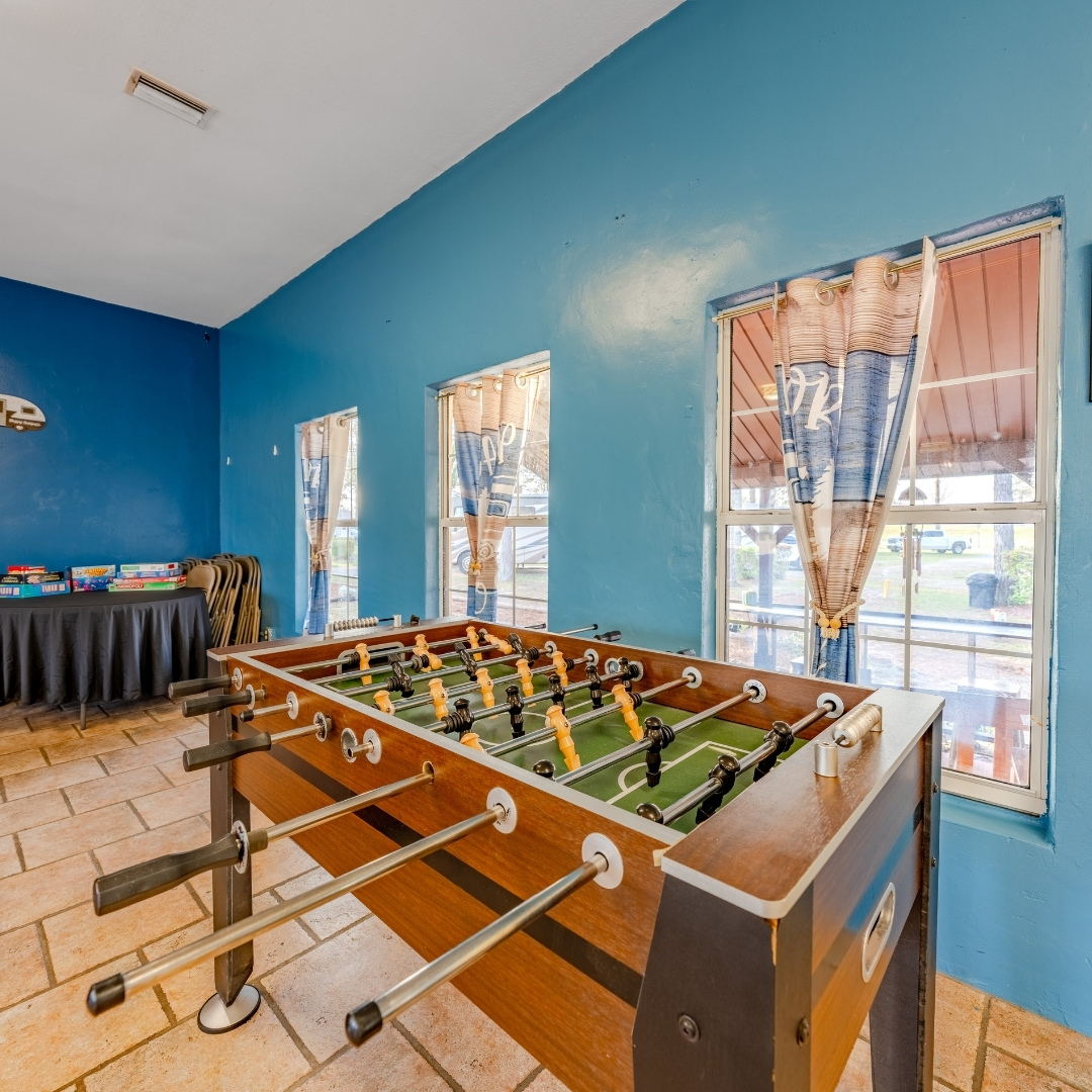 clubhouse interior at Lake City RV Resort featuring a foosball table